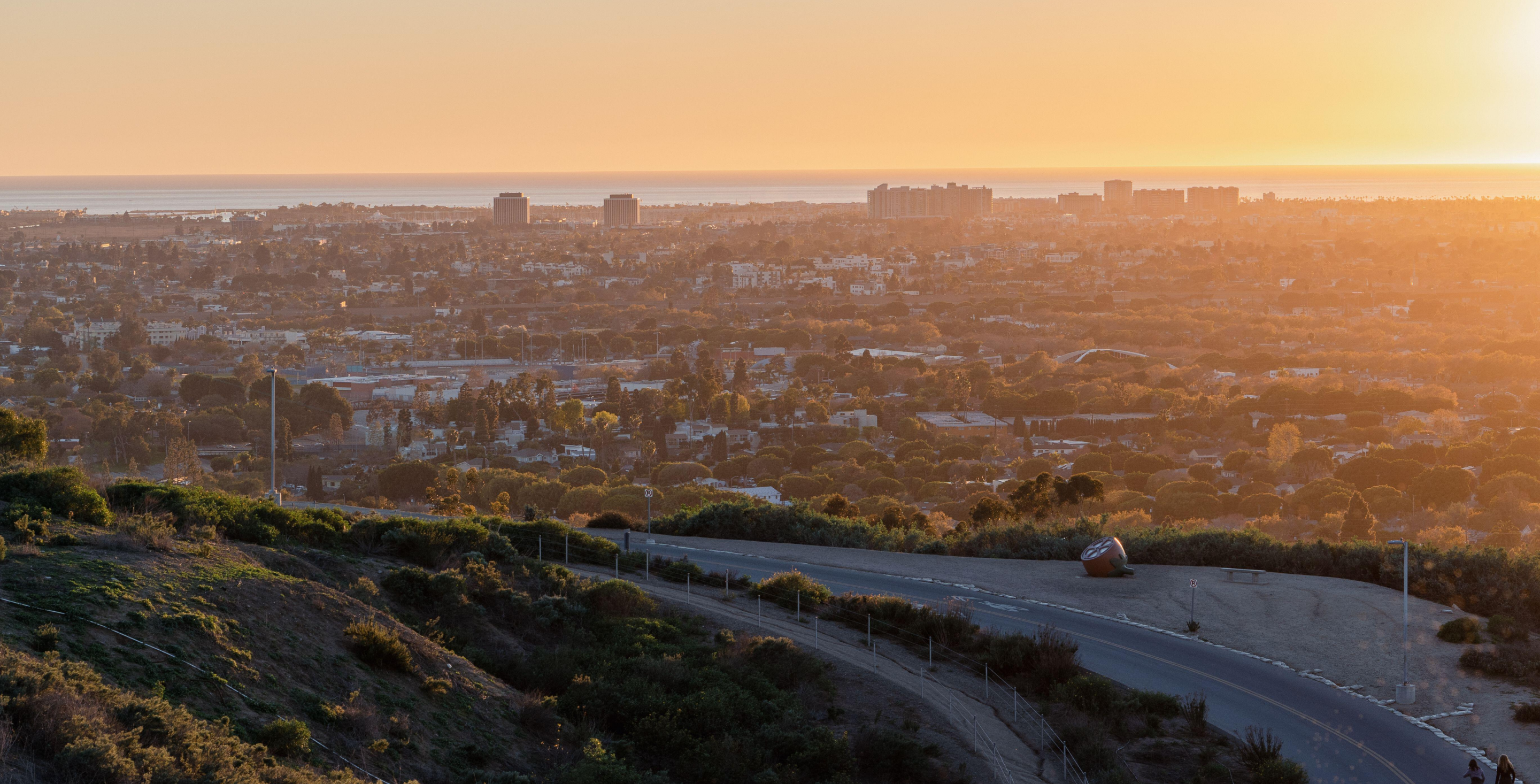 Views of the Pacific Ocean, beach, and surrounding communities