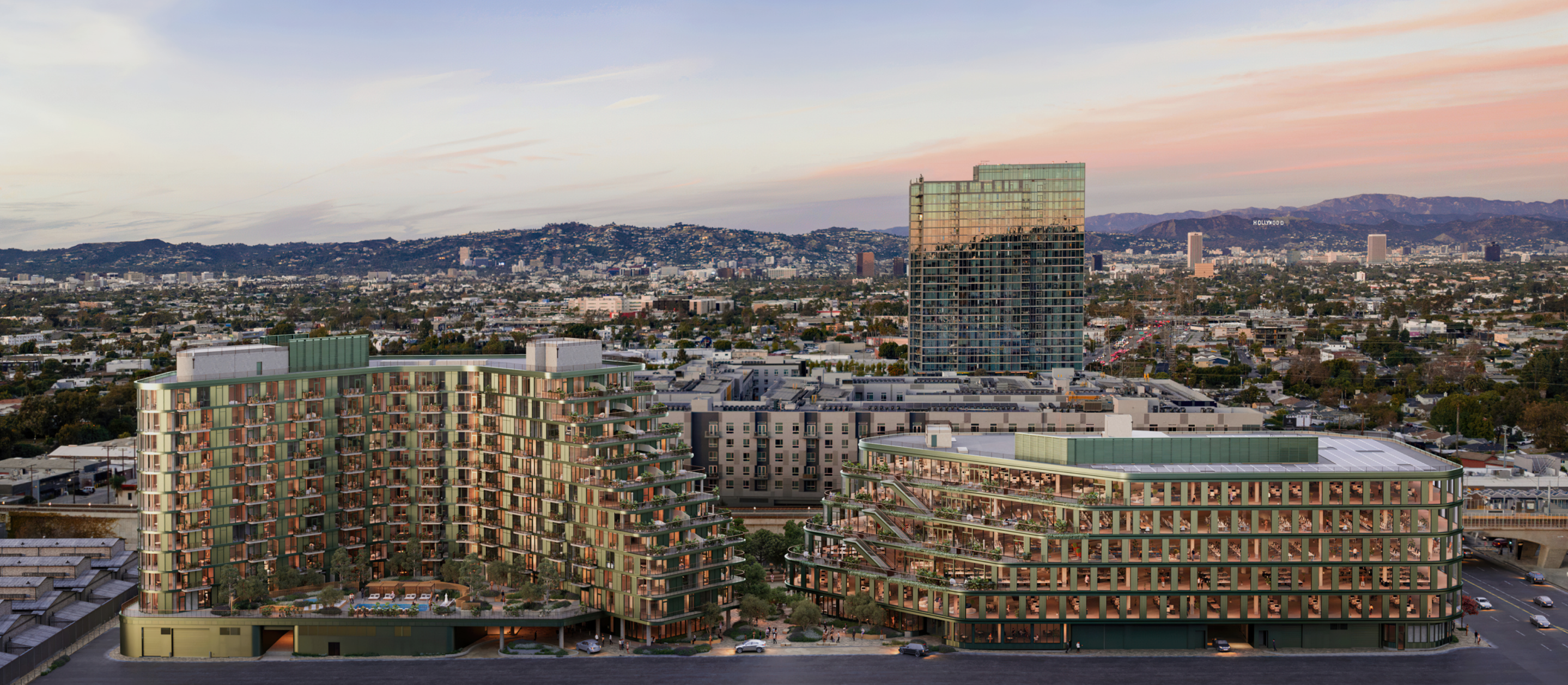 Habitat's mixed-use campus with apartment building on left and creative office building on right and extnsive LA views beyond